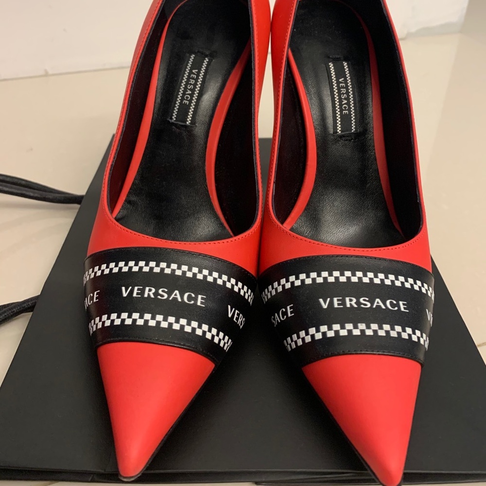 Versace used 1x, lightly used heels.